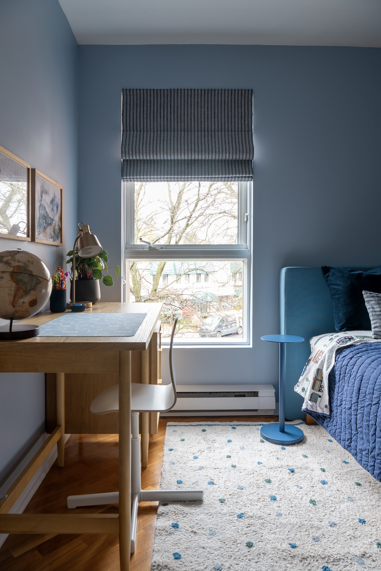 Bossuet project — aviation-themed boy's room with natural wood desk
