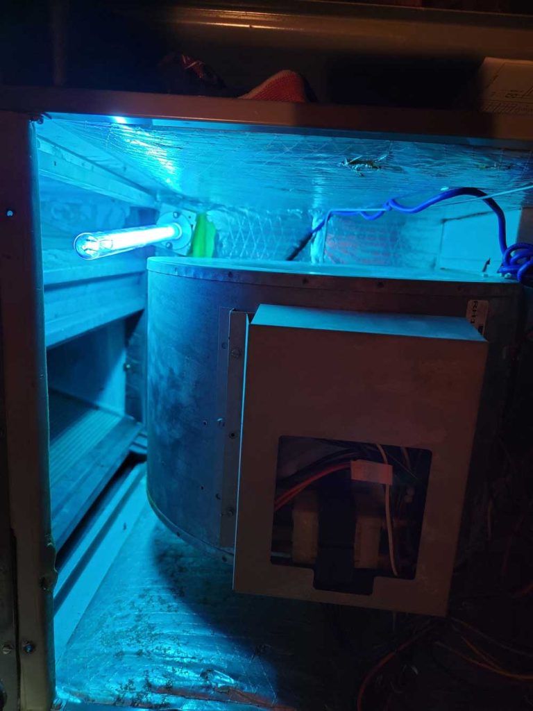UV light system inside air handler for indoor air quality