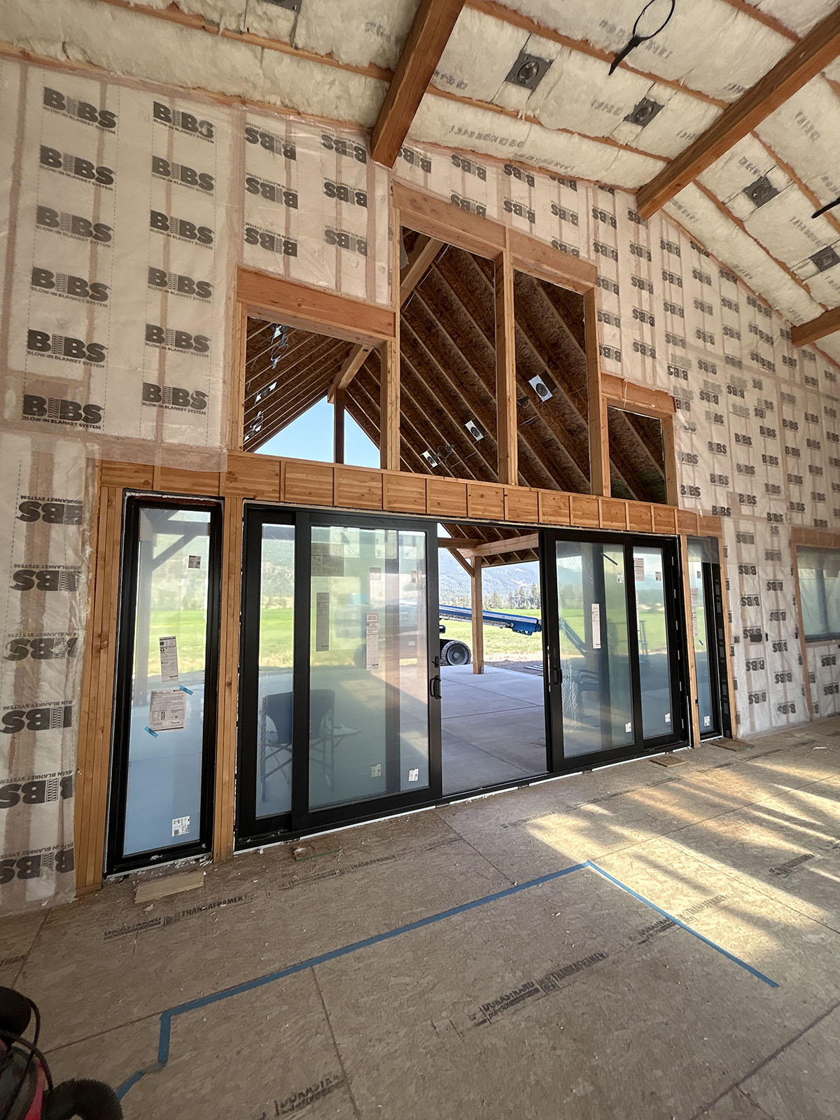 BIBS insulation installation with timber framing and sliding doors