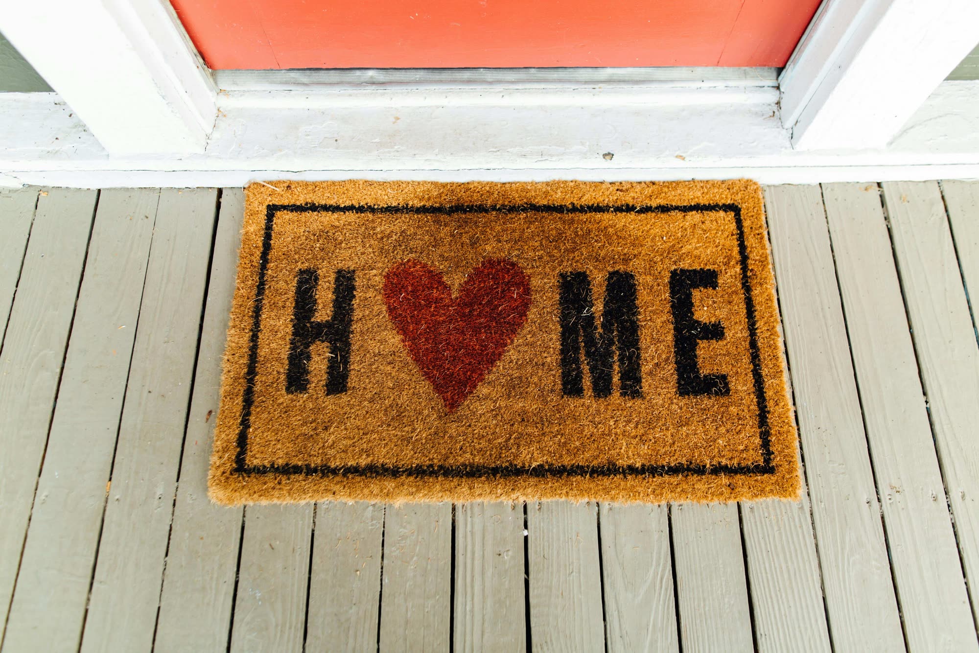 Front porch HOME doormat at a client residence