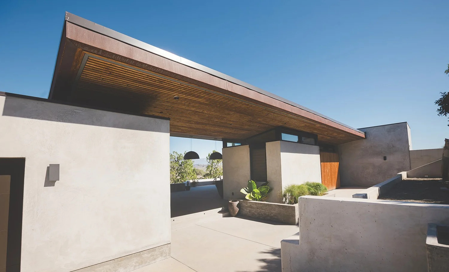 Custom home in Goleta with natural landscaping and large overhangs