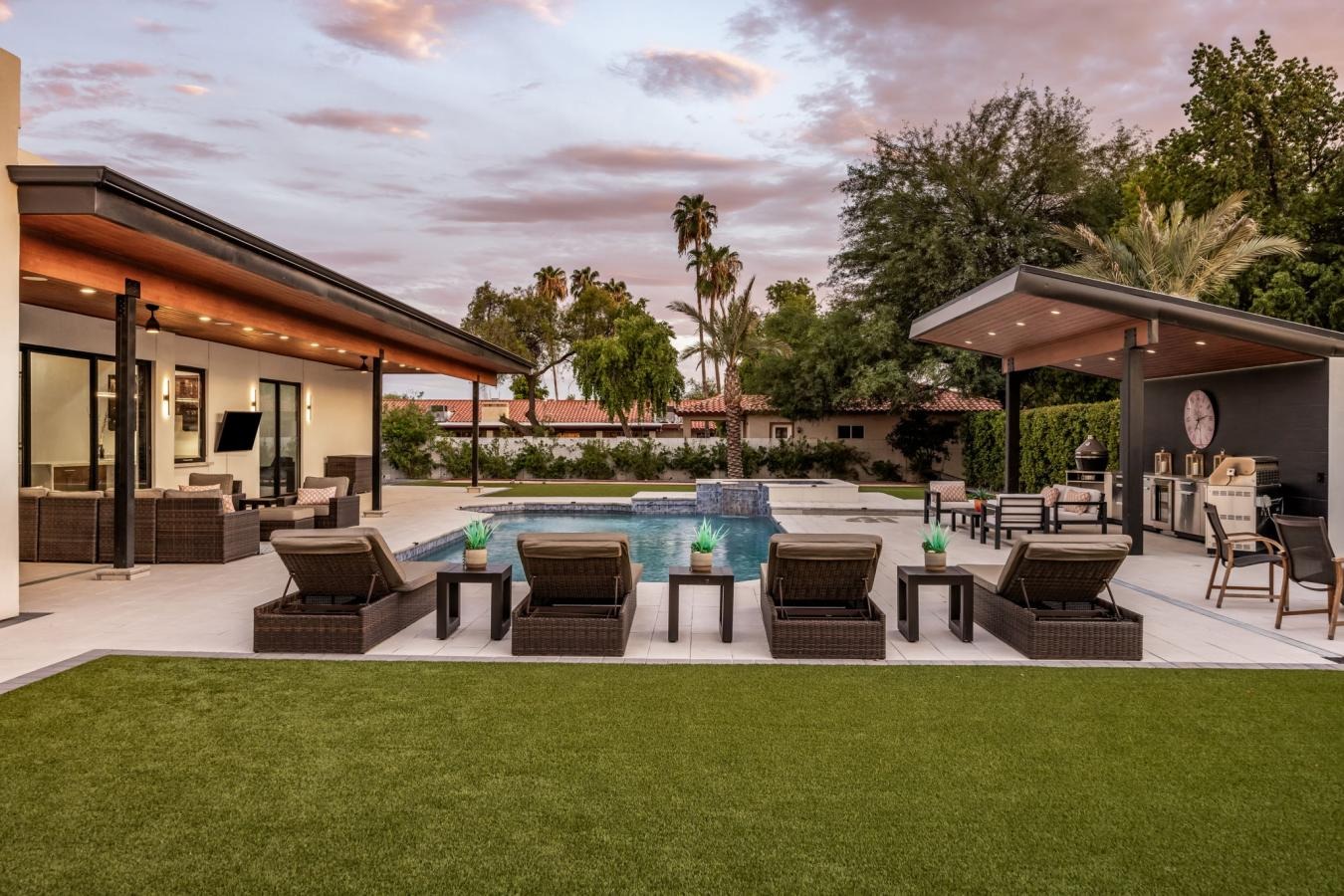 Covered patios, pool and outdoor kitchen at a Scottsdale property marketed by Marci Nedialkov.