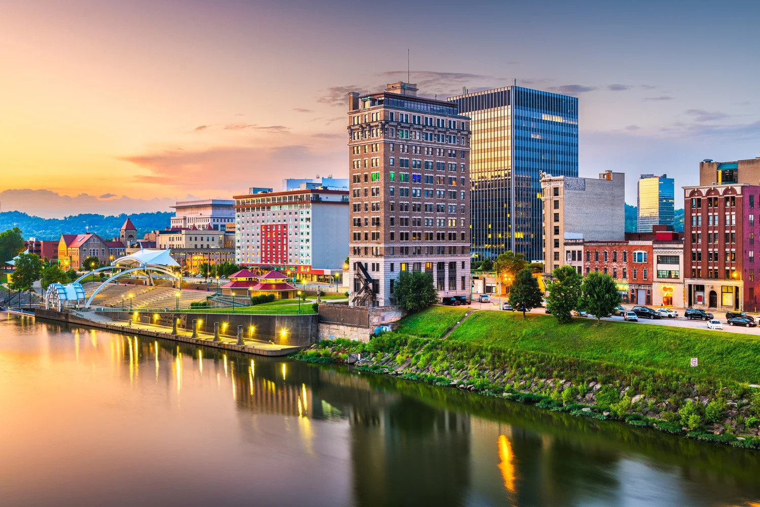 Charleston, West Virginia skyline at golden hour along the river
