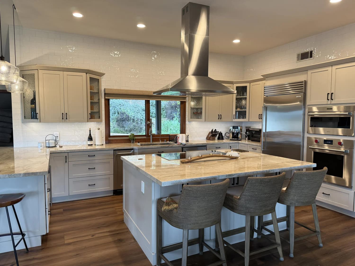 Open-plan kitchen renovation with island bar seating