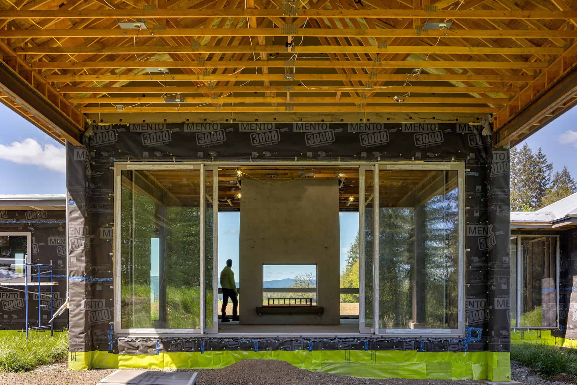 Vitadurra new construction project showing exposed framing and the Mento 3000 air barrier wrap on a Pacific Northwest home