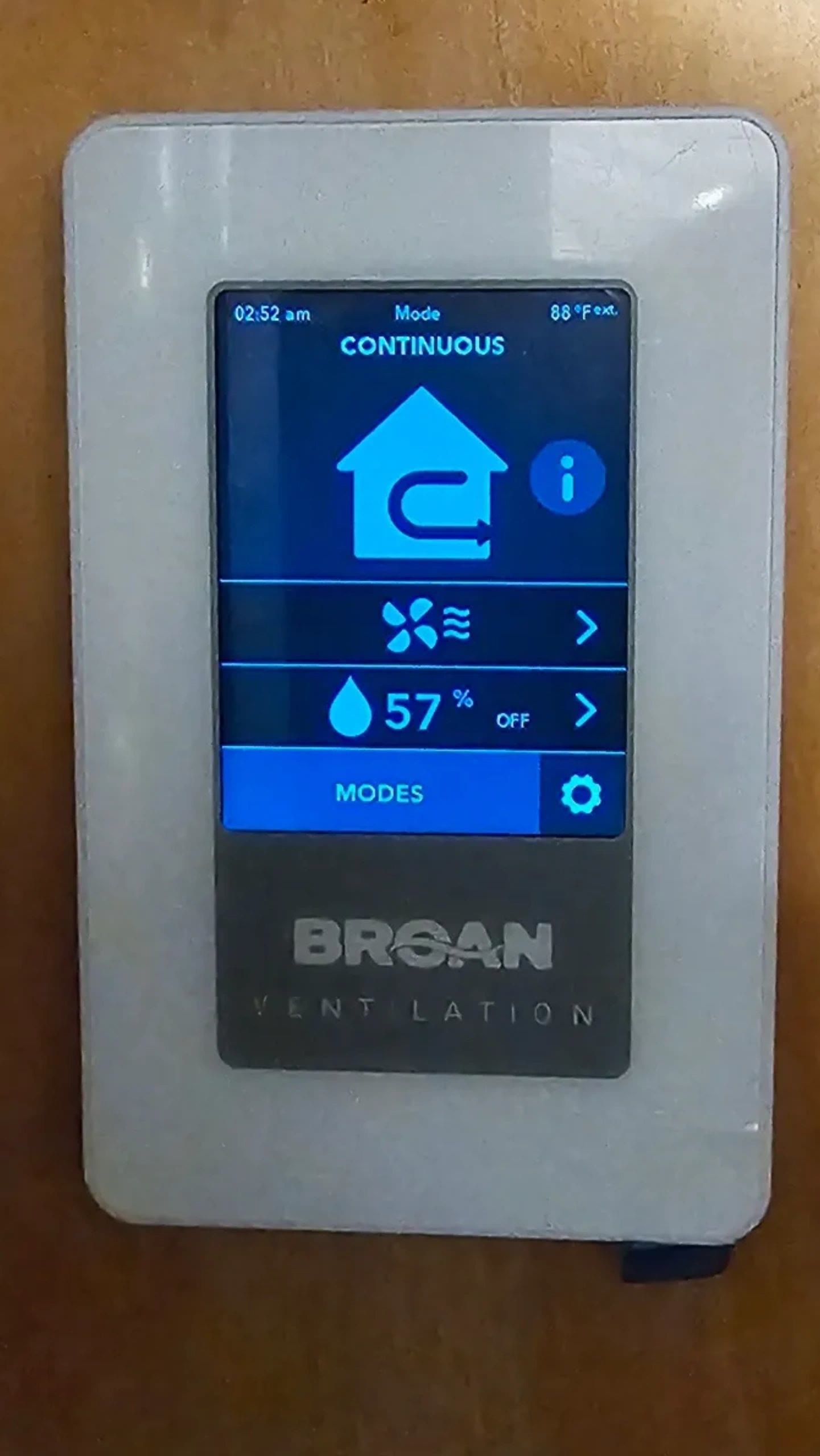 Broan ventilation controller showing CONTINUOUS mode at 57 percent humidity