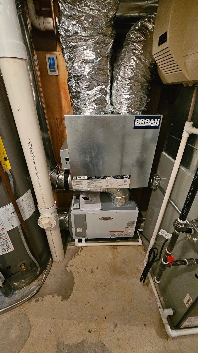 Basement mechanical room with Broan ERV over Aprilaire humidifier