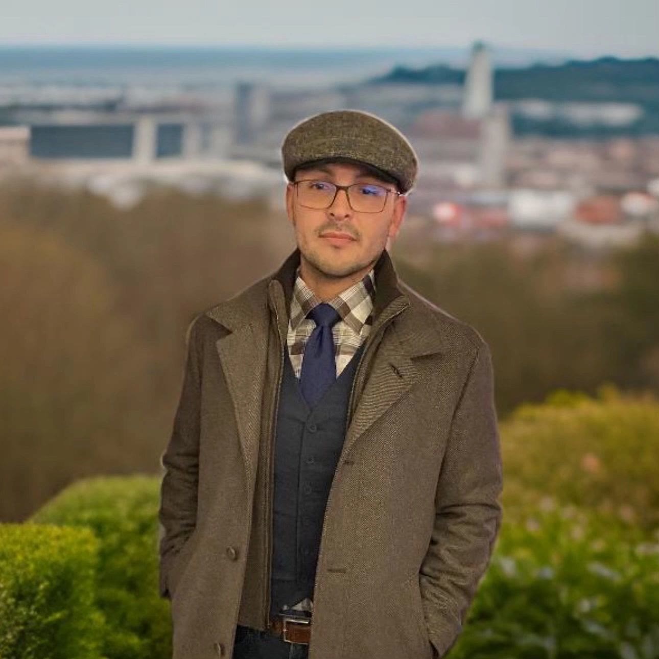 Rafael Bibian — Co-Founder — outdoor portrait with tweed cap