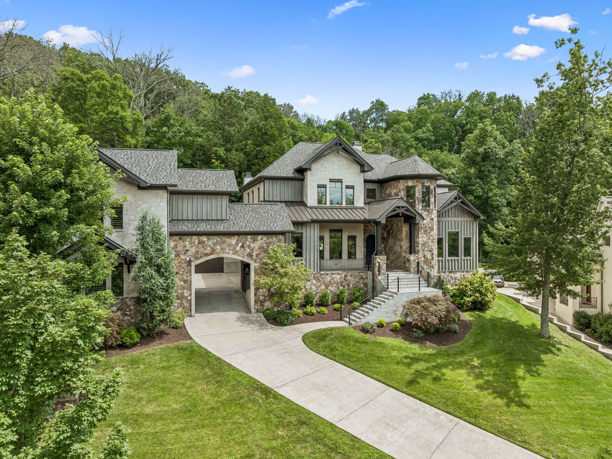 111 Guineveres Retreat in Franklin, TN — a six-bedroom, eight-bath estate inside the gated community of The Tors